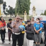Jelang Hari Bhayangkara ke-80, Ditlantas Polda Riau Gencarkan Kampanye Keselamatan Berlalu Lintas dan Green Policing di CFD Pekanbaru